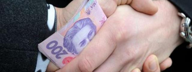 За хабарництво двоє поліцейських опинилися на лаві підсудних